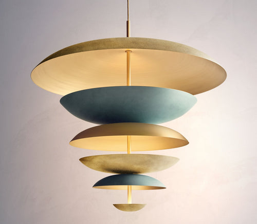 Modern pendant light with layered design on a neutral background