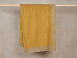 Load image into Gallery viewer, BEGG X CO ARRAN BORDER THROW / FLANNEL GOLD  59&quot; x 110&quot;
