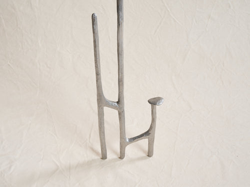 MARY BRŌGGER LEANING CANDLESTICK / ALUMINUM H72" x W8.5" x D5.5"